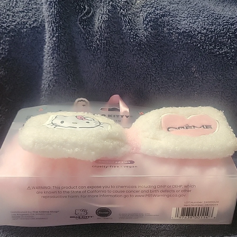 Hello Kitty Pink Plush Slippers and Headband Set. Skippers are size 7/8.
